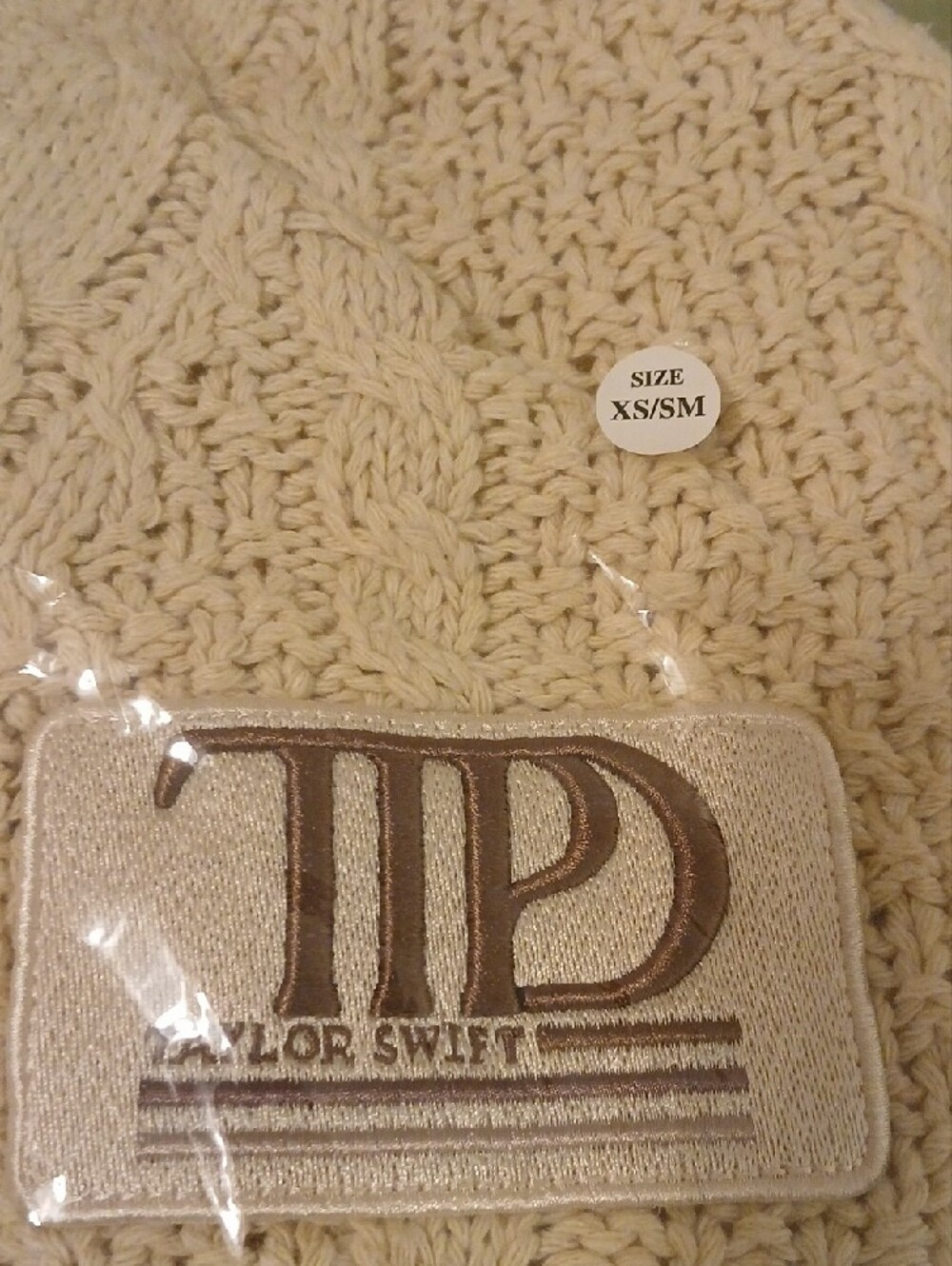 Taylor Swift Ladies Cream Cable Knit Cardigan with Brown Trim & Embroidery. - Picture 11 of 11